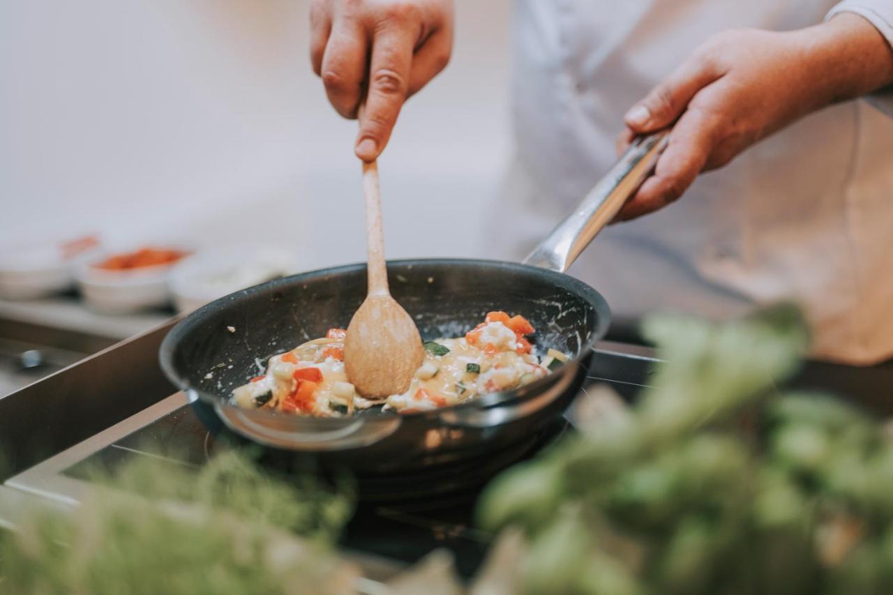 Hotel Miramare Crikvenica Luaran gambar A wooden spoon being used in a pan